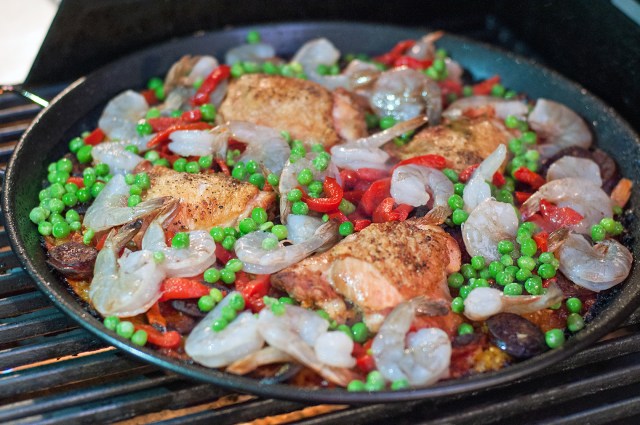 Adding the shrimp to the pan